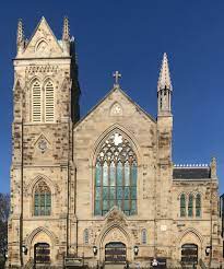 All saints signs temporary banners are hung at all five churches to welcome everyone to all saints parish; St Peter Christ Our Savior North Side Pittsburgh Pa