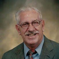 Charles J Busher (1933-2022)