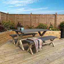 It would be impossible to list all the variations within one list, but just to give you a unlike wooden tabletops, concrete will not degrade or rot under extreme weather conditions. Charles Bentley Concrete Wood Dining Set Including Table Two Benches Garden From Beatsons Direct Uk