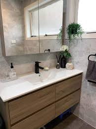 In tight bathroom spaces, the tub is usually squashed against one wall, completely filling that side of the room. Kris 1200mm Wall Hung Bathroom Vanity Single Basin Timber Look