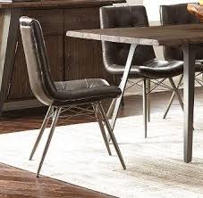 When you start designing an industrial dining room, you'll need to think about shopping for industrial dining chairs to pair with your table. Hutchinson Industrial Grey Dining Chair Pack Of 4 107852 Side Chairs Co Z Furniture