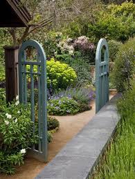 A Garden Gate Makes Such A Wonderful Addition To Any Outdoor Space Adding A Decorative Element Of Intr Garden Gate Design Garden Design Magazine Garden Design