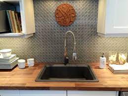 A kitchen can look unfinished without a backsplash. Backsplash Rolls Faux Tin Wallpaper Diy Backsplash Backsplash Metallic Backsplash