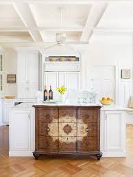 An antique bakery table, equipped with pottery barn baskets, functions as the kitchen island. 72 Unique Kitchen Island Designs Digsdigs