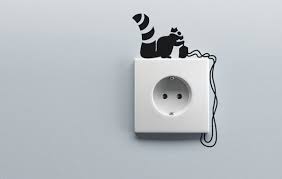 A hand of an electrician with multimeter probe at an electrical switchgear cabinet. 20 Creative Ways To Decorate Wall Outlets Hongkiat