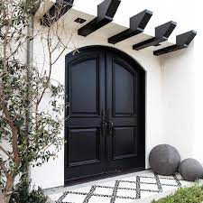 Mediterranean exterior by jauregui architecture interiors construction. Black Double Front Doors On Mediterranean Style Home Mediterranean Porch