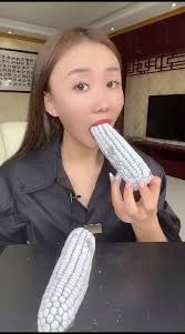 Little Black Boy Eating Corn