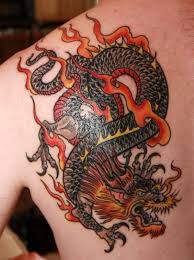 Black And Red Dragon Back Tattoo Red Dragon Tattoo On Shoulder Blade Dragon Tattoo Shoulder Dragon Tattoos For Men Red Dragon Tattoo