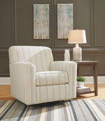 Usually ships within 6 to 10 days. The Alandari Gray Swivel Glider Accent Chair Available At Affordable Furniture Serving Avon Ma
