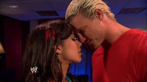 AJ Lee and Dolph Ziggler passionately kiss under the mistletoe: Raw, Dec.  24, 2012