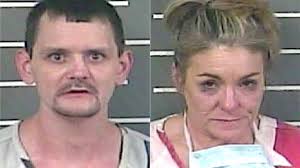 Couple charged following dog attack