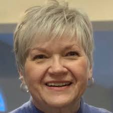 How to use a bread machine to make dough and then bake it in the oven?