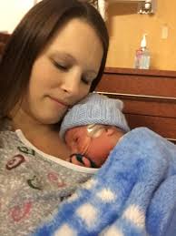 Saginaw's first baby born in 2017 came early for Bay County parents