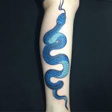 Scary snake tattoose on the leg. Light And Dark Blue Snake Tattoo On Leg Snake Tattoo Design Blue Tattoo Cool Tattoos