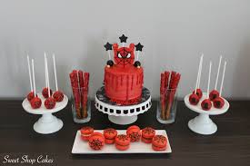 Chocolate Birthday Cake Cake Pops Spiderman Themed Dessert Table Macarons Birthday Cake Cake Pops And Chocolate Covered Pretzels Cake Themed Desserts Chocolate Covered Pretzels