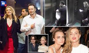 Well, at some point in 2016, amber heard and elon musk came out as an official couple. Elon Musk Tells Johnny Depp And Amber Heard To Bury The Hatchet And Move On As He Denies Threesome Daily Mail Online