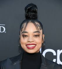 A bun is a type of hairstyle in which the hair is pulled back from the face, twisted or plaited, and wrapped in a circular coil around itself, typically on top or back of the head or just above the neck. Ella Mai S Baby Hairs Were Perfectly Laid At The Billboard Music Awards Teen Vogue