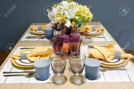 The first step is to set down the dinner plates. Dinner Table Setup Stock Photo Picture And Royalty Free Image Image 15354570