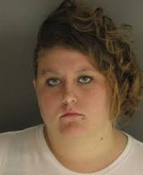 Murder suspect's wife arrested for sneaking contraband