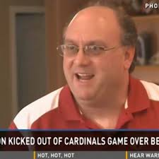 Fan claims he was ejected from Arizona Cardinals game for having  15-year-old son hold his beer