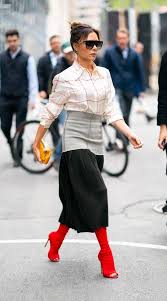 Victoria Beckham Is Determined To Make This Weird Boot Trend A Thing This Winter Victoria Beckham Outfits Victoria Beckham Victoria Beckham Style