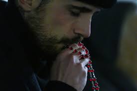 Catholic News Service added a new...