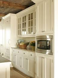 Shelter Interiors Llc Stunning Country Kitchen With Cream Kitchen Cabinets Paired Kitchen Cabinet Design Kitchen Cabinet Styles Shaker Style Kitchen Cabinets