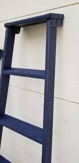 A simple and easy diy project, this is a great way to upcycle an old and rickety ladder. Old Wooden Ladder Plant Stand My Repurposed Life Rescue Re Imagine Repeat