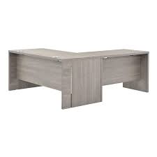 You can use it as a corner desk, but it also works in the center of the room as well. Tivo Gray L Shaped Desk El Dorado Furniture