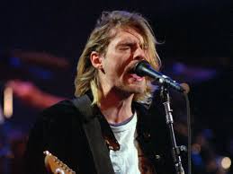 This image released by julien's auctions shows an olive green cardigan sweater worn by nirvana frontman kurt cobain during nirvana's mtv's 'unplugged' performance. Kurt Cobain S 50th Birthday Remembering An Icon Music Gulf News
