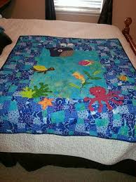 Free counted cross stitch patterns are easy to save and print out for use in creating lovely home decorations and gifts. Under The Sea Baby Quilt For Baby Kevin This Is A Crazy Nine Patch With Sea Animals Applique I Made The Center A Sea Baby Quilt Baby Quilts Ocean Baby Quilt