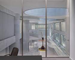 christ gantenbein unwraps lindt home of chocolate on lake zurich red brick exteriors kilchberg architecture