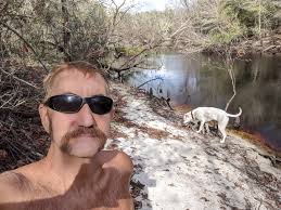 Playing in the creek leads to bath time