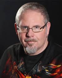 It is with a heavy heart that I share the news of Andy Watkins passing  today. I've known Andy since 2014-5 (iirc) when he first started making  gaming tables and dice. I