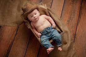 Foto De Bebe Menino Usando Um Chapeu De Cauboi E Mais Fotos De Stock De Bebe Istock