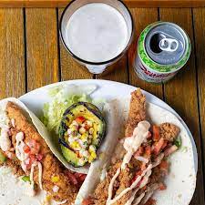 When hunger strikes after a day splashing on the beach walk up the street to red fish taco for a cold drink and a quick meal. Red Fish Taco Red Fish Village Blue Mountain Beach Fl