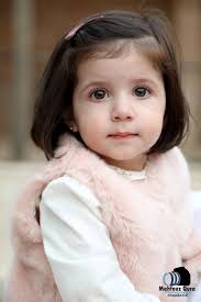 تصوير تعميد ( سيلين & ايلين ميشيل صويص ) لسر المعمودية والميرون المقدس في  كنيسة الروم الارثوذكس القديس جاورجيوس