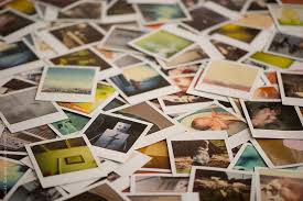 Table Covered In Polaroid Photos By Lucas Saugen Polaroid Photos Polaroid Pictures Instant Photography
