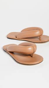 Don't bother to buy the clock. Pillow Sandals Are A Comfy Chic Summer Shoe Trend