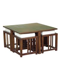 Smaller living rooms might not accommodate the tables with four extra seating spaces. This Coffee Table With Hidden Stools Is What You Need To Create More Seats For Your Guests
