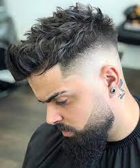 The mid fade haircut offers the perfect balance between a low and high fade, blending the hair on the sides and back to create a versatile and fashionable look. 50 Best Mid Fade Haircuts For Men 2021 Guide