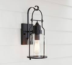 Farmhouse outdoor lights are mostly used to accessorize the front porch or main entrance of a house. Taylor Metal Outdoor Sconce Pottery Barn