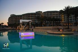 Acrylic Stage With Led Lights Make A Statement For This Pool Party Decor Pool Party Decorations Event Lighting Event Planning