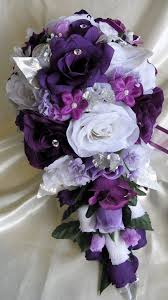 White bride with bouquets in shades of purple, bridesmaids in purple dresses, grey suits and purple ties for groom and groomsmen, grey table linens with purple napkins… Wedding Bouquet Bridal Silk Flowers Cascade Plum Purple Silver Etsy