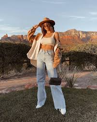 Highlight your legs with this pair of bell bottom jeans that are made of soft and breathable fabric. From Rockstars To Street Style Flared Pants Are Back How To Wear Flared Jeans Pants Tre