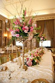 These gorgeous open roses are handmade from fine quality mulberry paper. Love The Hanging Votives Candelabra Centerpiece In The Coronado Bal Table Arrangements Wedding Wedding Reception Flower Arrangements Wedding Reception Flowers
