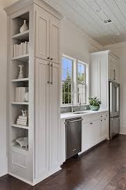 Wood, stainless steel, acrylic, and styles: Kitchen With Built In Cookbook Shelves Transitional Kitchen