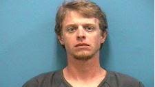 Stuart man charged with stealing guns