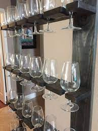 Later on you will cut along these lines to make the grooves where the glasses slide into the holder. Champagne Wall And Stand Party Champagne Glass Holder In 2021 Champagne Wall Wall Wine Glass Rack Diy Wine Glass Rack