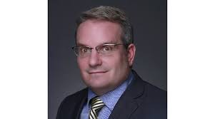 Charles Olson is recognized by Continental Who's Who